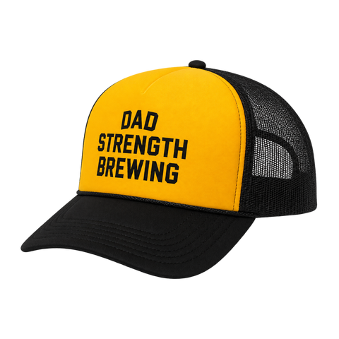 A yellow and black trucker-style cap with the words 'DAD STRENGTH BREWING' printed in black on the front panel, shown on a plain white background.